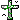 cross covered in vines
